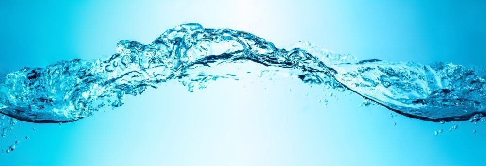 Blue water wave with bubbles close-up background texture. Big size large photo. - IWAG